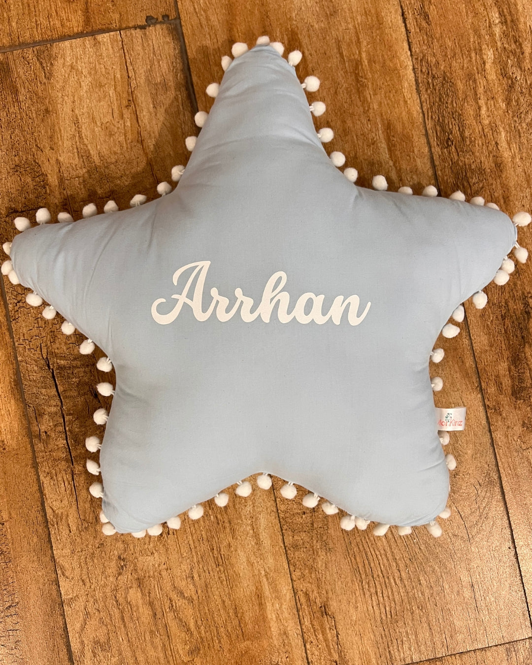 Colourful Pom Pom Star Shaped Cushion- Playful and Cozy